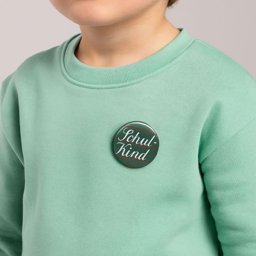 Ansteckbutton SCHULKIND von Krima Isa